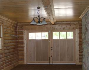carriage doors allow an unobstructed ceiling space