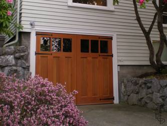 Carriage doors give this walk-out basement garage a whole new look.