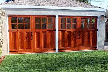 New carriage house with Olympic 6 lite craftsman style carriage garage doors